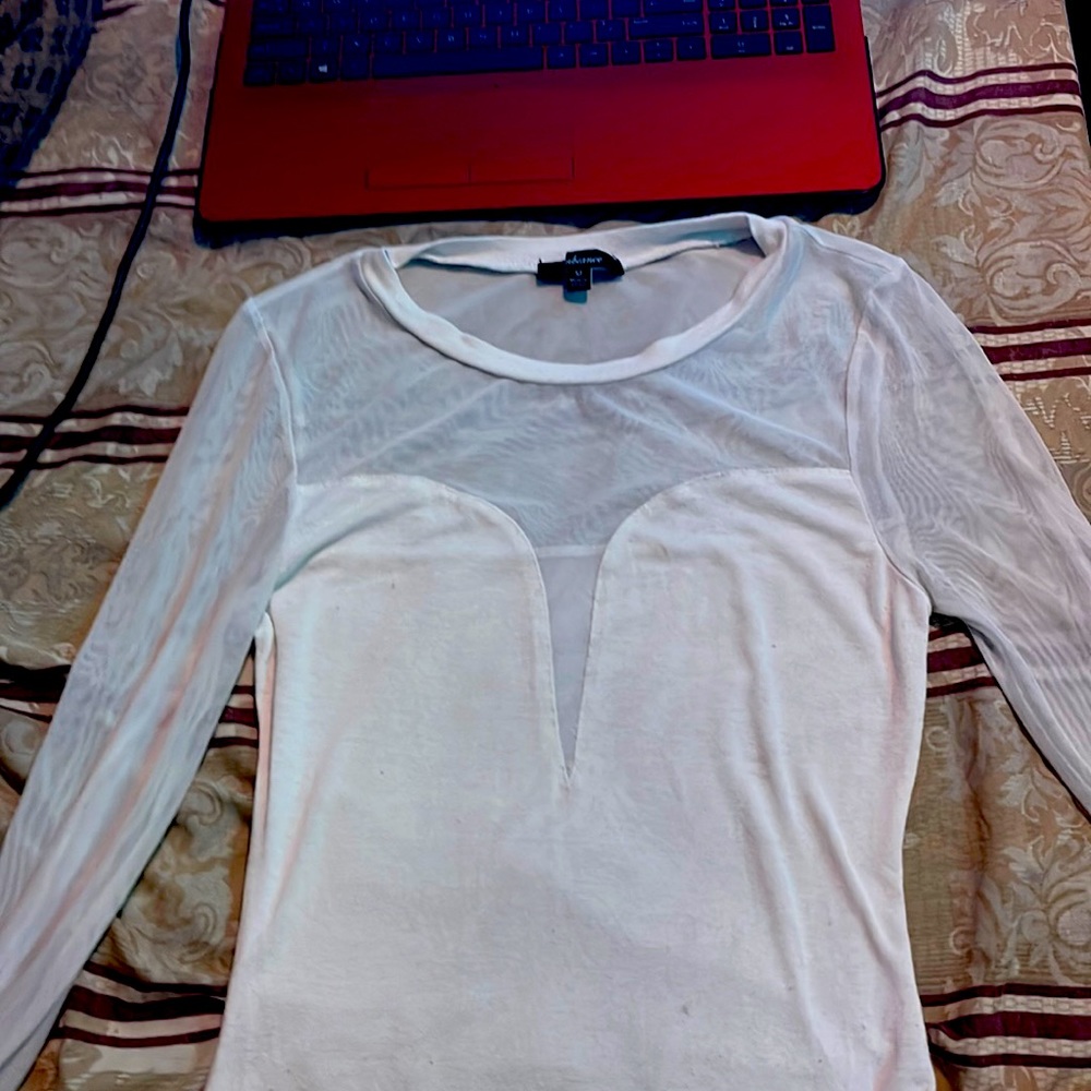Long sleeve white figure skating type shirt